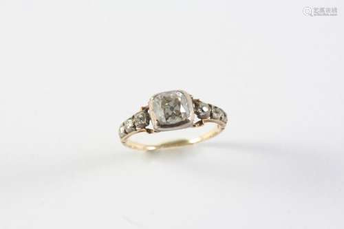 A GEORGE III DIAMOND RING centred with a cushion-shaped diam...