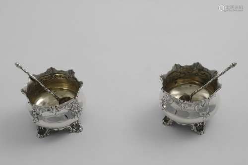 A PAIR OF VICTORIAN SALTS with shaped and everting rims and ...