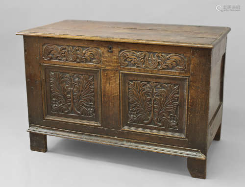 A 17TH CENTURY OAK COFFER WITH TWO PANEL FRONT, with a three...