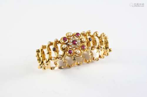 A GOLD, RUBY, DIAMOND AND PEARL SET EXPANDING BRACELET the o...