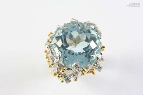 AN AQUAMARINE AND DIAMOND RING the circular-cut aquamarine s...