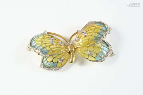 A DIAMOND AND ENAMEL BUTTERFLY BROOCH mounted with yellow an...