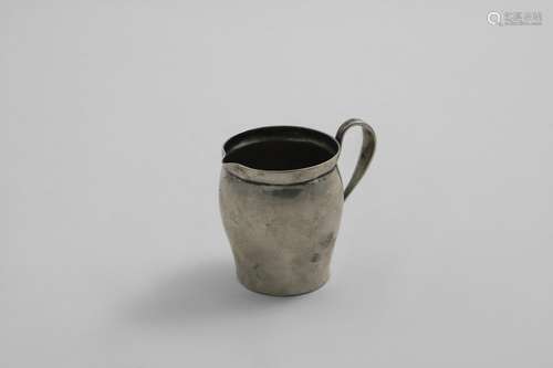 A SMALL EARLY 19TH CENTURY AUSTRO-HUNGARIAN CREAM JUG with a...