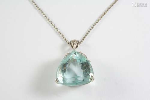 AN AQUAMARINE AND DIAMOND PENDANT the pear-shaped aquamarine...