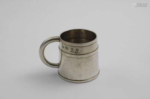 A MID 20TH CENTURY SMALL HANDMADE MUG with a tapering body d...