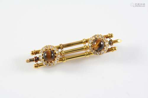 A GOLD, TIGER'S-EYE AND DIAMOND BROOCH the gold three bar br...