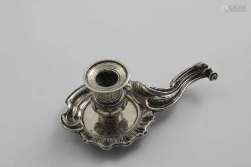 A LATE 19TH CENTURY CONTINENTAL CHAMBERSTICK with a cast bor...
