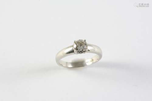 A DIAMOND SOLITAIRE RING the round brilliant-cut diamond wei...