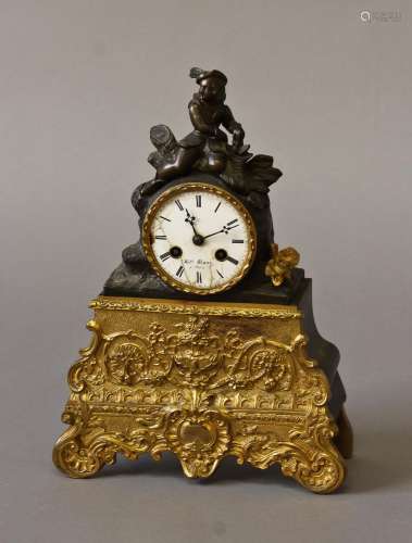 A FRENCH BRONZE AND ORMOLU MANTLE CLOCK BY H. MARC OF PARIS,...