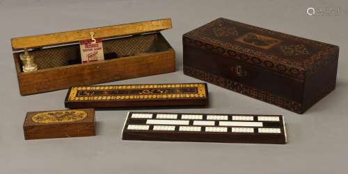 A TUNBRIDGE WARE BOX AND SIMILAR CRIBBAGE BOARDS ETC. the ro...