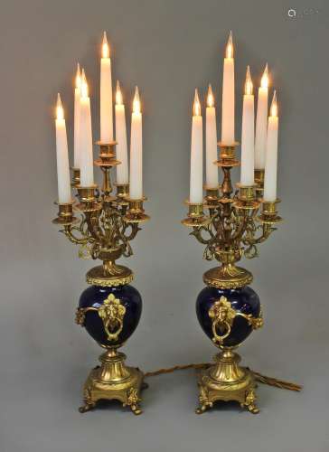 A PAIR OF GILT METAL AND BLUE ENAMEL SIX BRANCH CANDELABRA, ...