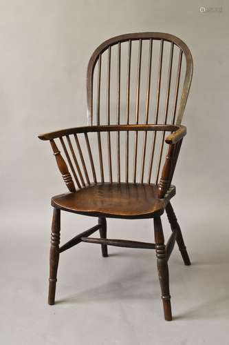 A 19TH CENTURY HIGH BACKED WINDSOR ARMCHAIR, beech, ash and ...