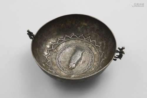 A 19TH CENTURY TWO-HANDLED CIRCULAR DISH chased in the centr...