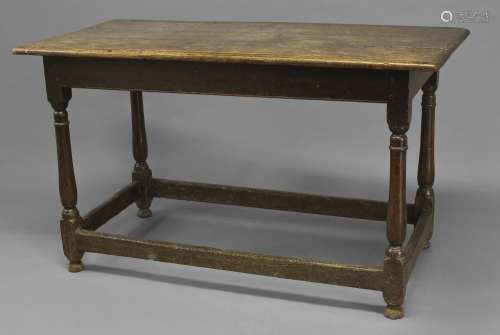 AN 18TH CENTURY OAK SIDE TABLE, with a three plank rectangul...