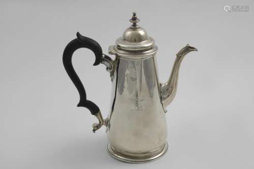 A GEORGE II COFFEE POT with a plain tapering body, a tucked-...