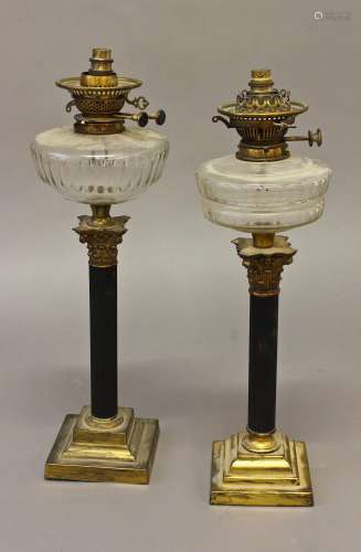 A NEAR PAIR OF CORINTHIAN COLUMN FORM TABLE LAMPS, with fitt...