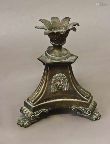 A 19TH CENTURY BRONZE CANDLESTICK IN THE MANNER OF THOMAS HO...