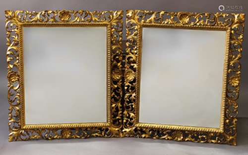 A PAIR OF ROCOCO STYLE WALL MIRRORS, each with rectangular p...