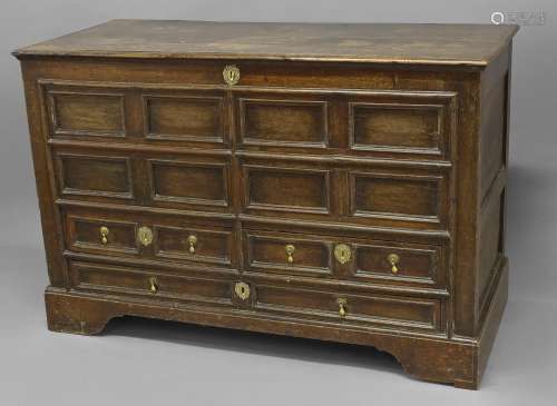 AN EARLY 18TH CENTURY MULE CHEST, with a broad rectangular t...