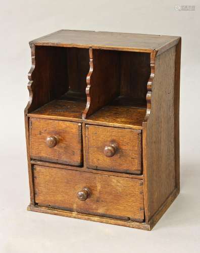 A HANGING OAK SPICE CABINET, the oak cabinet with two shelve...