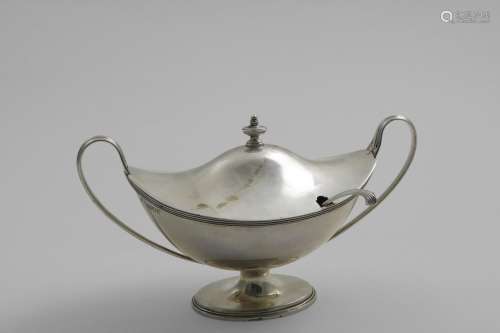 A LATE VICTORIAN BOAT-SHAPED SAUCE TUREEN AND COVER with ree...