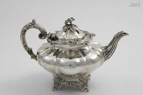 AN EARLY VICTORIAN SCOTTISH PROVINCIAL TEA POT with a shaped...