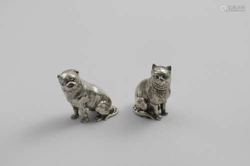 A PAIR OF VICTORIAN NOVELTY PEPPERETTES realistically cast i...