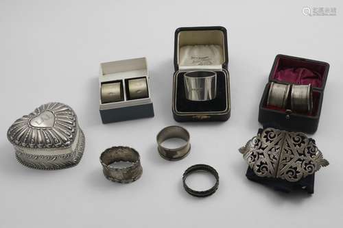 A BOXED SINGLE NAPKIN RING a boxed pair of napkin rings engr...