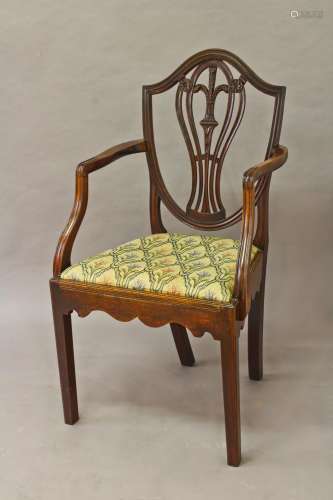 A MAHOGANY HEPPLEWHITE STYLE ARMCHAIR, with a shield shaped ...