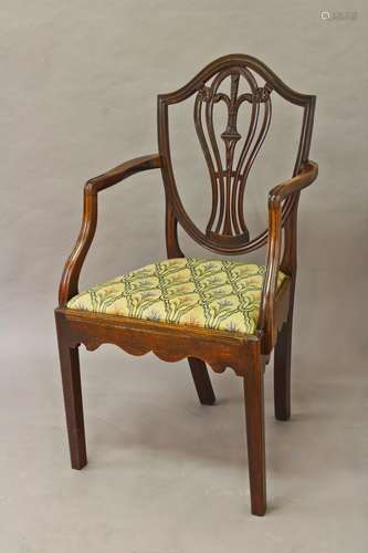 A MAHOGANY HEPPLEWHITE STYLE ARMCHAIR, with a shield shaped ...