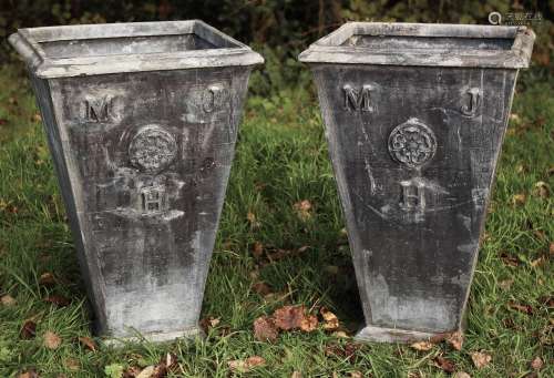 A PAIR OF TALL LEAD PLANTERS, each of square tapering form d...