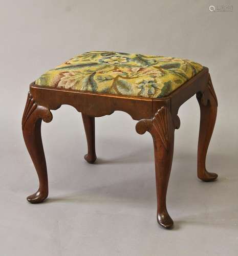 A QUEEN ANNE STYLE WALNUT FRAMED STOOL, the rectangular top ...