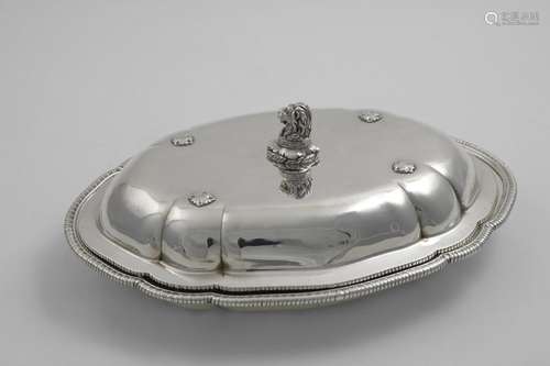 A GEORGE III SHAPED OVAL ENTREE DISH AND COVER with gadroone...