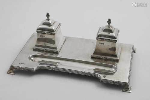 AN EARLY 20TH CENTURY INKSTAND on a shaped rectangular base ...