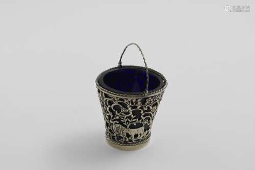AN EDWARDIAN CREAM PAIL with pierced decoration and a blue g...