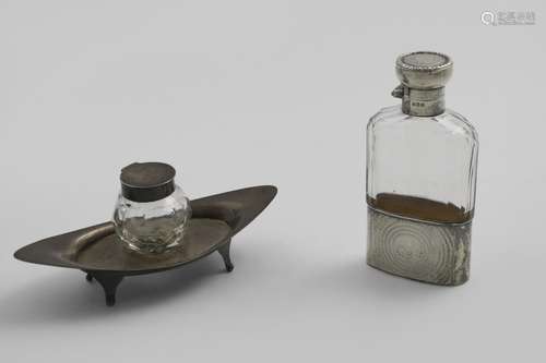 A MOUNTED CUT-GLASS SPIRIT FLASK with engine-turned decorati...