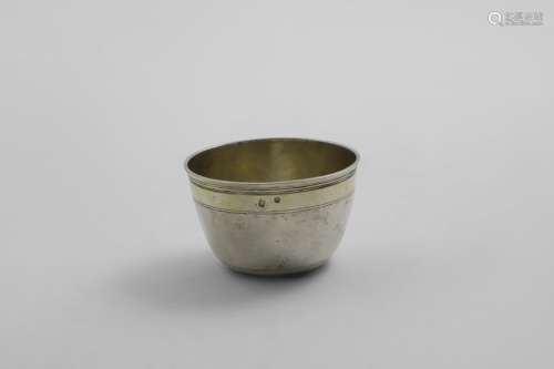 AN EARLY 18TH CENTURY GERMAN PARCELGILT TUMBLER BEAKER with ...