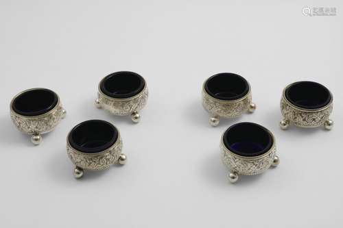 A SET OF SIX VICTORIAN SQUAT CIRCULAR SALTS on ball feet wit...