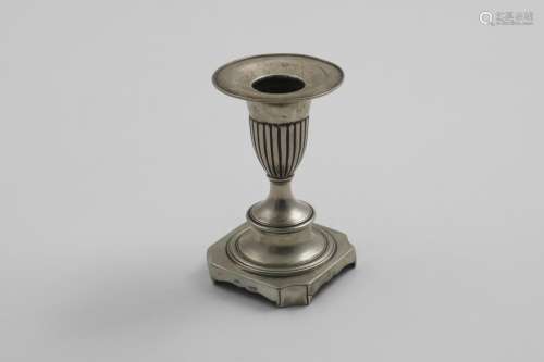 AN EARLY 19TH CENTURY PORTUGUESE SHORT CANDLESTICK on a cant...