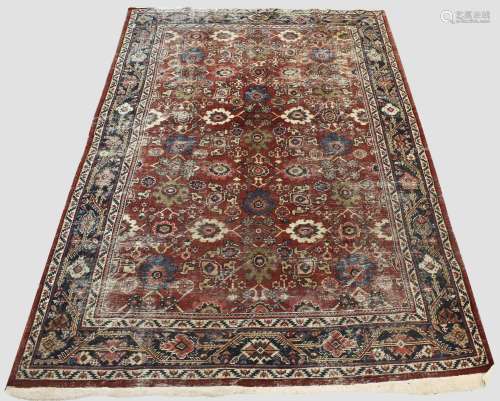 MAHAL CARPET, West Iran, circa 1920. The madder field with a...