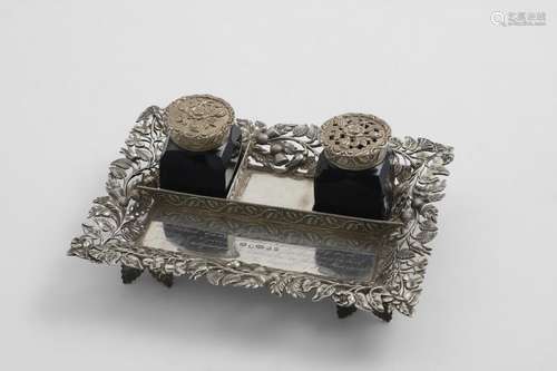 A SMALL EARLY VICTORIAN INKSTAND fitted with two mounted blu...