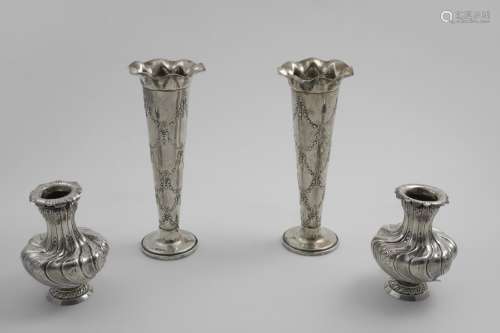 A PAIR OF EDWARDIAN VASES with a stamped pattern of paterae ...