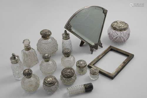 THIRTEEN VARIOUS MOUNTED GLASS BOTTLES AND JARS a late 20th ...