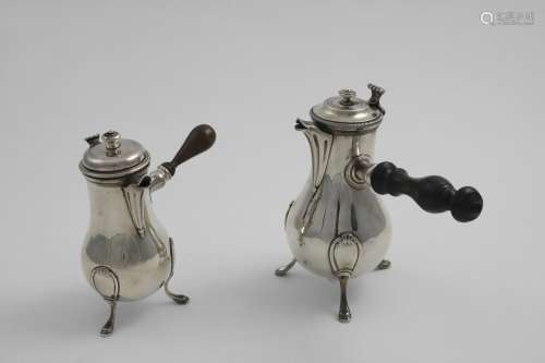 A LATE 18TH CENTURY FRENCH BALUSTER HOT MILK JUG on three le...