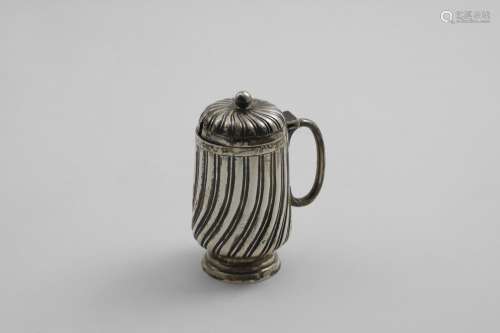 A VICTORIAN MUSTARD POT with wrythen-fluted decoration, a ba...