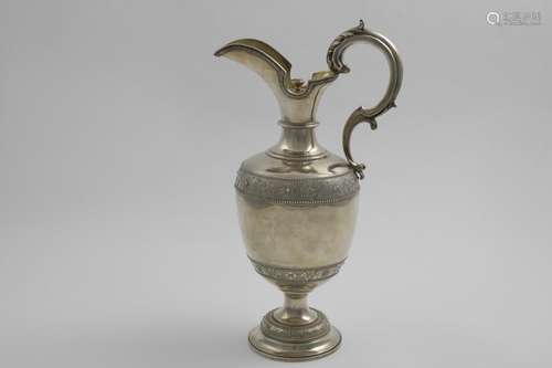 A VICTORIAN WINE EWER in the form of a classical urn with a ...