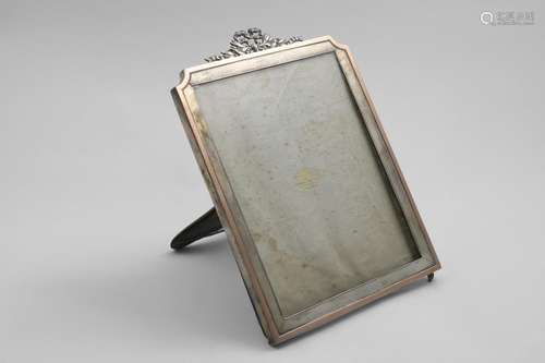 AN EDWARDIAN RECTANGULAR PHOTOGRAPH FRAME with incurved top ...