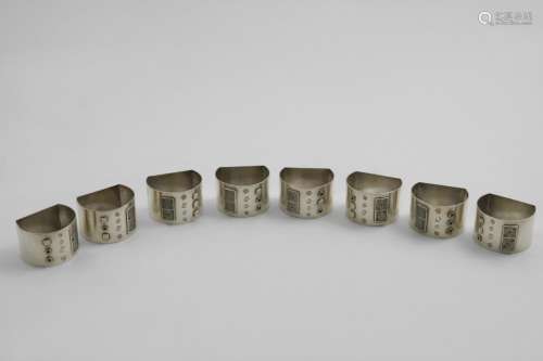 A LATE 20TH CENTURY SET OF EIGHT NAPKIN RINGS with flat base...