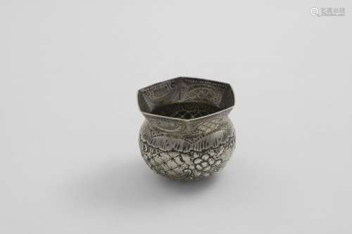 A SMALL CONTINENTAL BEAKER with embossed decoration and a he...