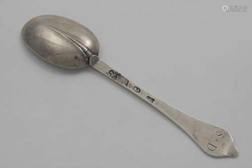 A WILLIAM III WAVY-END OR DOGNOSE TABLE SPOON with a bead an...